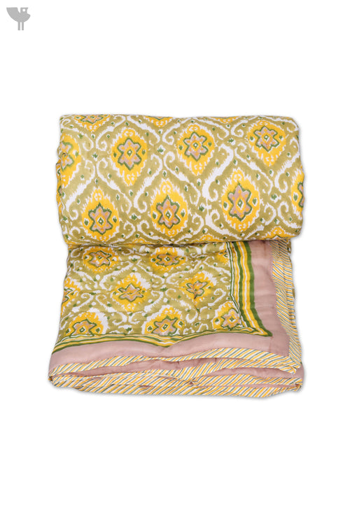 Mulmul Cotton Quilt In Ikat Block Print