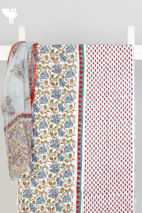 Cambric Cotton Dress Material With Kota Doria Dupatta In FloralBlock Print