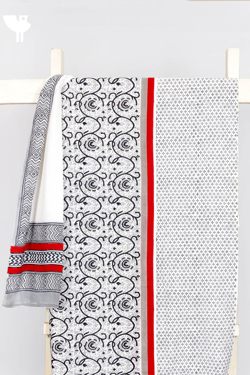 Cambric Cotton Dress Material With Mulmul Dupatta In Graphic Block Print
