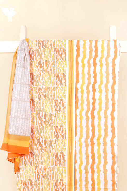 Cambric Cotton Dress Material With Mulmul Dupatta In Abstract Block Print