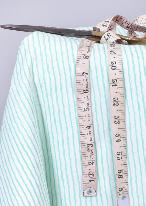 Cambric Cotton In Fine Striped Print